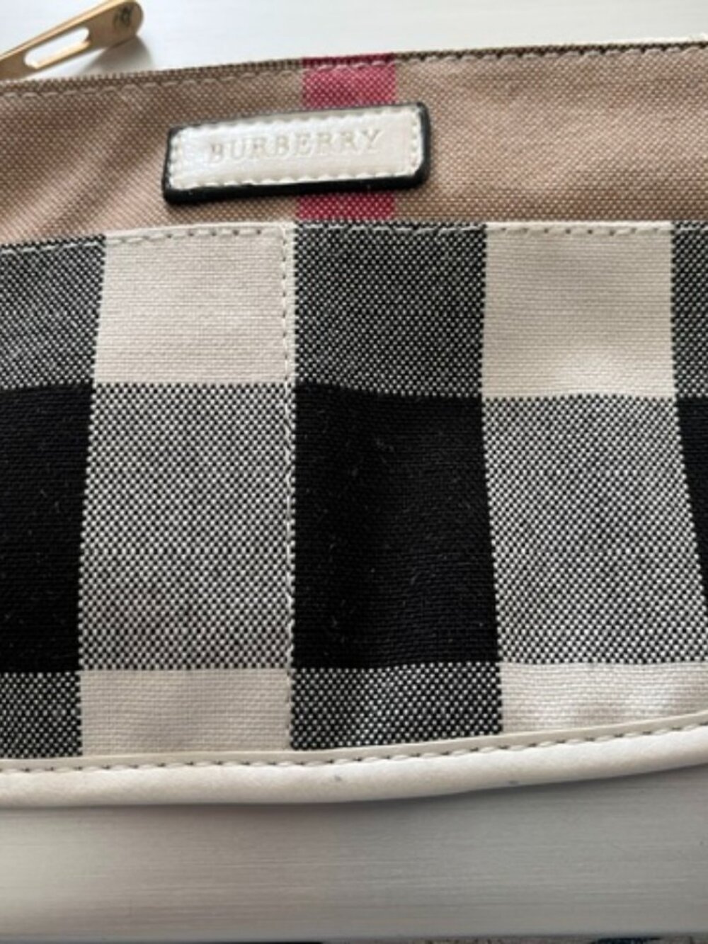 Burberry toiletries pouch.